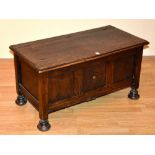 An oak blanket box, with hinged lid,