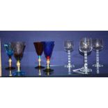 Four matching crystal glasses by Salviati, decorated with twist stems, 20cm high,