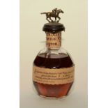 A shoppers village special reserve Kentucky bourbon, with horse and jockey surmount, dumped on, 25.
