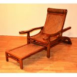 A reproduction hardwood birthing chair,