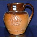 A glazed pottery whisky/water jug, circa late 19th century/ early 20th century,