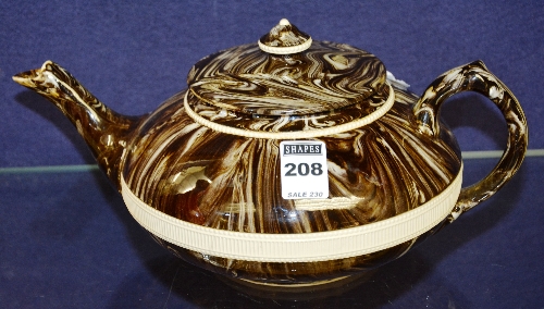 A Moorcroft Macintyre glazed teapot, circa early 20th century,