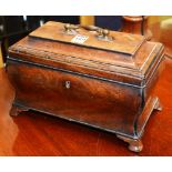 A Regency mahogany tea caddy with carry handle, lacking interior,