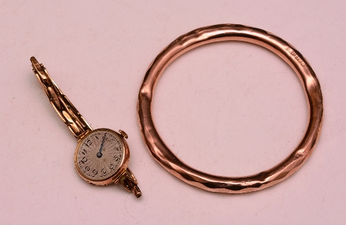 A large 9ct gold bangle, stamped 375, 15.