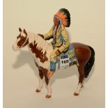 A Beswick figure of a north American Indian, mounted upon a skewband horse,