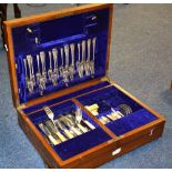 A part canteen of plated cutlery in fitted oak case,