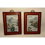 A pair of Chinese famille verte porcelain wall panels, depicting river and landscape scenes,