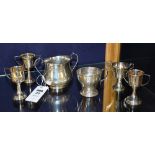 Four small silver prize cups circa 1950's, hallmarks for Birmingham, engraved to three examples,