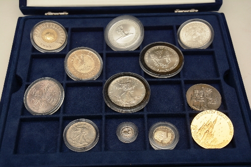 A quantity of silver proof coins, to include American 1994 one dollar coin,