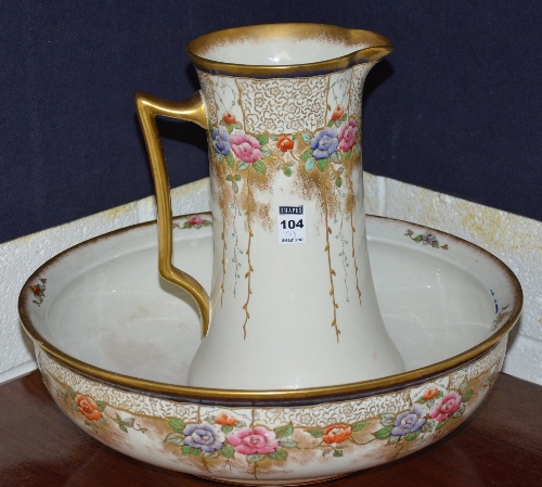 An Adderley pottery toilet ewer with matching basin, ewer 32cm high,
