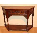 An Old Charm oak two tier side table, with canted corners and single drawer,