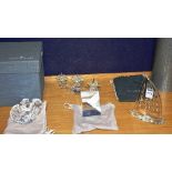 A Swarovski crystal candle holder, with three sconces, 7cm high x 20cm wide, with tubed box,