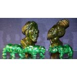 Five Kenyan polished hardstone figures, comprising of two malachite coloured rhino's, 13cm long,