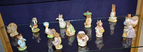 Thirteen Beswick 'Beatrix Potter' Figures, circa 1940's, 50's, 60's, & 70's,