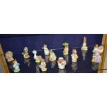 Thirteen Beswick 'Beatrix Potter' Figures, circa 1940's, 50's, 60's, & 70's,