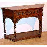 An Old Charm oak two tier side table, with canted corners and single drawer,