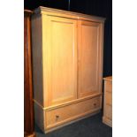 A pine two door wardrobe, circa late 19th early 20th century,