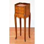 A French style chest of drawers, of small form, with tray top, above three drawers,