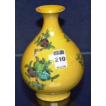 A Chinese glazed pottery oviform vase, decorated with coconut trees on yellow ground,