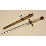 A 3rd Reich naval officer's dagger, with brass eagle surmount, replacement grip, and brass scabbard,