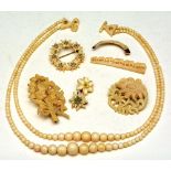 A small collection of ivory and faux ivory jewellery,