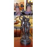 A French bronzed figural table lamp in the form of classical boy and girl,