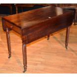 A Victorian mahogany Pembroke table, with single drawer and opposing dummy drawer, with drop leaves,