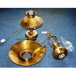 An oil lamp ceiling light, with glass funnel and chain attachment, approx 68cm high,