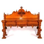A William IV oak sideboard circa 1835, in the Jacobethan or Olde English style,