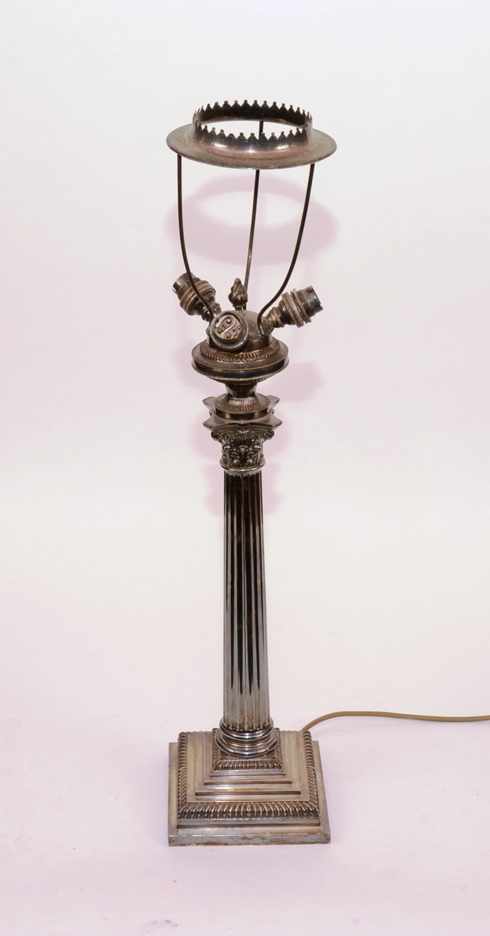 An Edwardian silver plated lamp, circa 1910, with Corinthian column support,