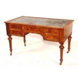 A Victorian walnut kneehole desk,