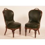 A set of six William IV mahogany library chairs, upholstered in leather, with metal rails to top,