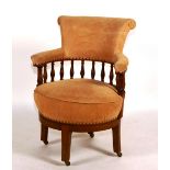 A French oak desk armchair, circa 19th century, of large size with swivel seat,