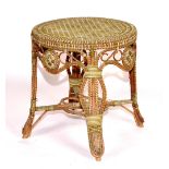 A rattan conservatory table, with circular top,