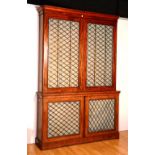 An early Victorian mahogany bookcase circa 1841, the two sections with grill-fronted doors,