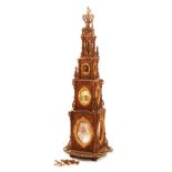 A fretwork photo spire, circa late 19th century, in the form of a tower,