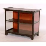 An Oriental ebonised display cabinet, circa 1900, with glazed doors and sides,