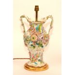 A 19th century porcelain vase lamp by Rockingham, circa 1855, with flower encrusted decoration,