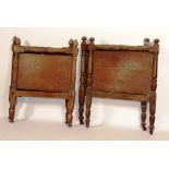 A pair of Irish oak single bed ends, circa 1825,