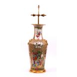 A large 19th century Chinese famille rose vase lamp, circa 1880, decorated with panels of figures,