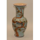 A Chinese style glazed pottery vase, with flaring neck,