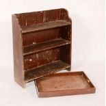 A 19th century butlers tray, 65cm long, together with an open bookcase,