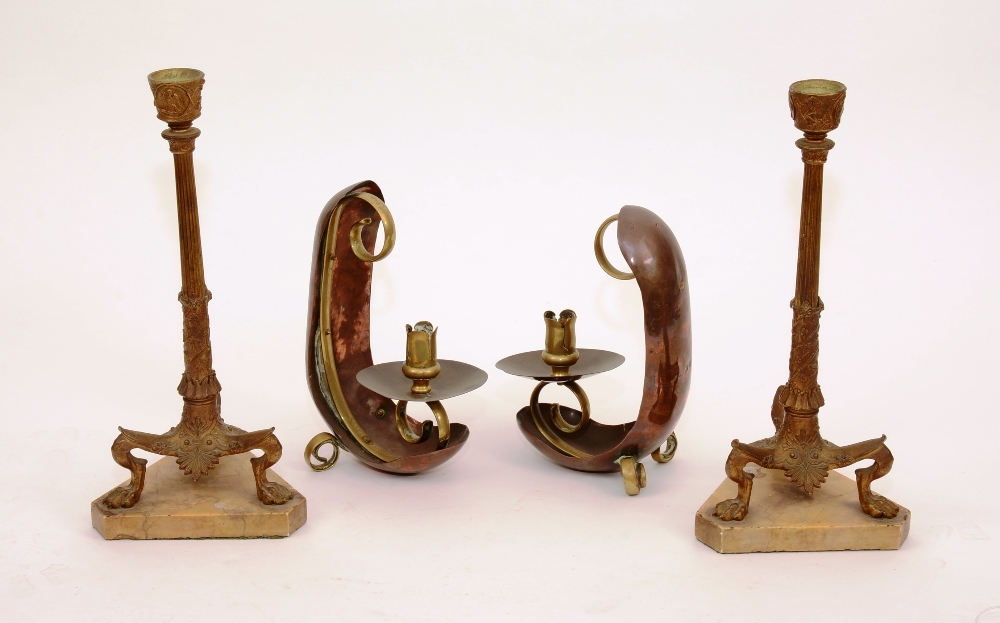 A pair of 19th century gilt bronze and marble candlesticks, in archaeological Roman inspired taste,