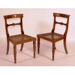 A set of four Regency chairs, inlaid with brass on beechwood frame,