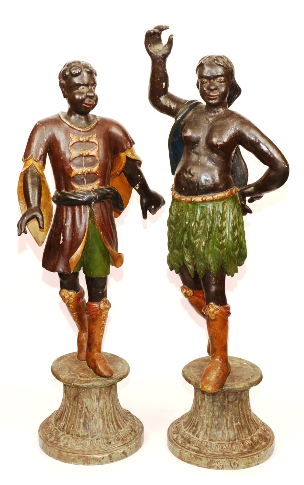 A pair of Italian Blackamoor figures, circa early 18th century, in the form of a male and female,