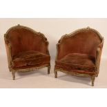 A pair of French painted bergere armchairs, circa 19th century, upholstered in velour,