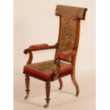 An early Victorian rosewood armchair, circa 1840, with grospoint needlework upholstery,