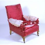 A William IV giltwood bergere armchair, circa 1830,