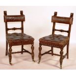 A set of four Victorian walnut dining chairs, circa 1870, with buttoned leather backs and seats,