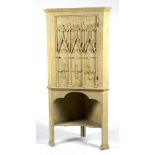 A George III Gothic corner cupboard, circa 1765 and later,